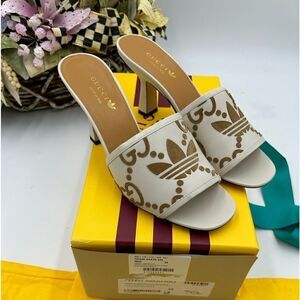 Women’s Gucci X Adidas, slide leather sandals, size 38, made in  Italy
